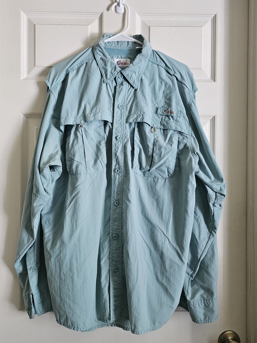 Classic World Wide Sportsman long-sleeve button-up fishing shirt in a muted ligh